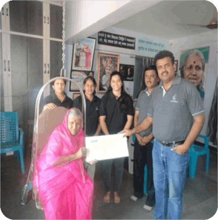 Visit to social activist Sindhutai Sapkal by Optima Life Science, highlighting our commitment to community engagement and social responsibility.